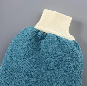 Detail of thickened double-sided exfoliating bath glove texture and elastic cuff