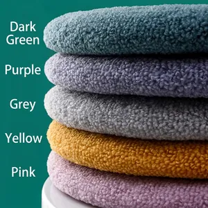 Thick warm washable knitted toilet seat cover in various pastel colors and soft plush