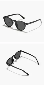 Detail views of classic black round frame sunglasses with UV protection and rivets