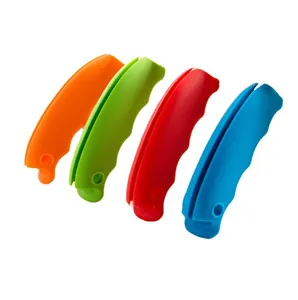 Ergonomic candy-colored silicone grocery bag carrier handles in four bright colors.