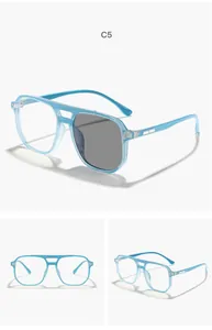 Detailed view of children pilot style glasses with photochromic blue light blocking lenses