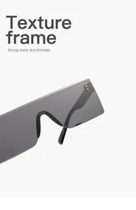 Primer plano de gafas de sol rectangulares grises sin montura con patillas texturizadas