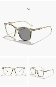 Detail view of children's square frame photochromic anti-blue light glasses in light green