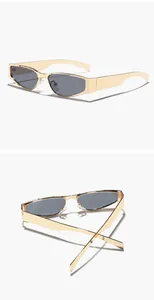 Close-up views of narrow gold metal sunglasses from the front and the back angles.