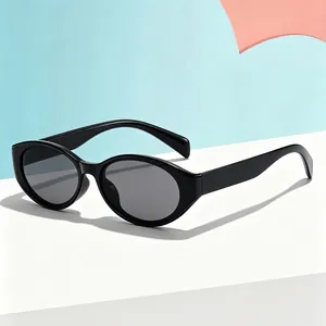 Retro children's cat-eye sunglasses featuring black UV protection PC frames and grey lenses