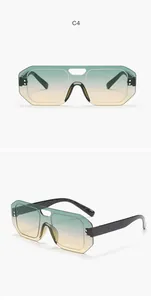 Detail view of rimless aviator sunglasses with stunning green and orange gradient lenses
