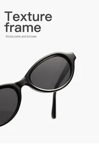 Close-up detail of black vintage oval sunglasses featuring a high-gloss PC texture frame
