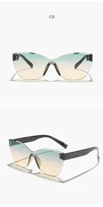 Rimless cat-eye sunglasses with green gradient lenses shown from front and side angles.