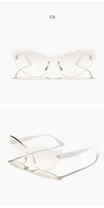 Detail view of white rimless cat-eye sunglasses with transparent lenses C6