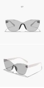 Front and side views of rimless cat-eye sunglasses with quilted temples and studs