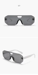 Front and side views of oversized grey shield sunglasses with white temples