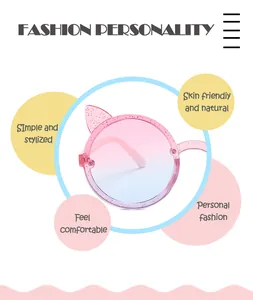 Detail of children's pink cat-ear sunglasses with a glittery frame and gradient lenses.