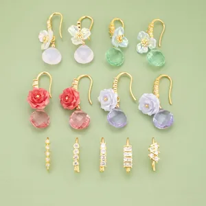 Variety of DIY 18K gold-plated floral earrings with crystal drops and studded components.