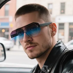 Fashionable oversized rimless pilot sunglasses with blue gradient lenses worn by male model