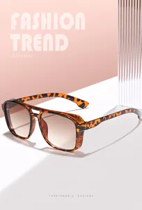 Detailed view of tortoiseshell steampunk sunglasses with side shields and brown gradient lenses