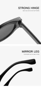Detail view of the strong hinge and comfortable mirror leg on black cat-eye sunglasses.