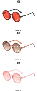 Primer plano de gafas de sol para niños con cara sonriente en varios colores