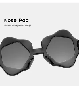 Detail of comfortable ergonomic nose pads on stylish kids' flower sunglasses.