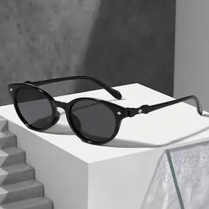 Minimalist black cat-eye sunglasses for outdoor sun protection, unisex style