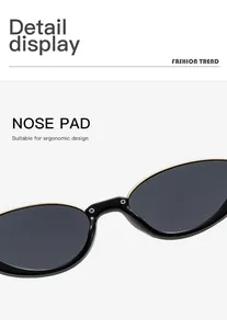 Close-up view of the ergonomic nose pad design on black half-frame cat-eye sunglasses