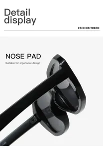 Detail view showing the comfortable ergonomic nose pad of black retro sunglasses