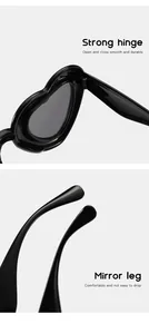 Detailed macro shots of heart-shaped sunglasses showing durable hinges and comfort legs