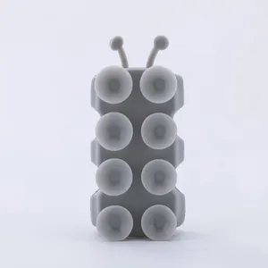 Grey caterpillar suction cup shower head holder with 8-cup silicone base