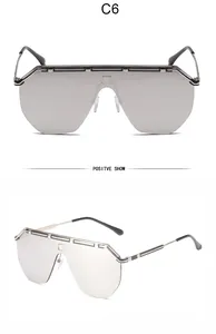 Front and side views of retro oversized shield sunglasses with silver mirrored lenses