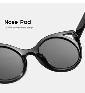 Detailed view of the ergonomic nose pad on cute cat ear style sunglasses for children.