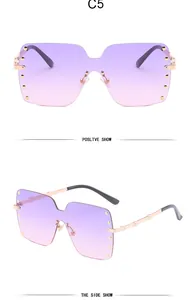 Front and side views of purple gradient rimless oversized sunglasses with gold rivets