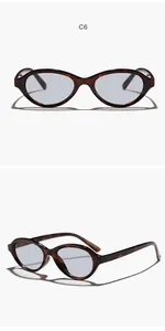 Detailed views of stylish retro oval sunglasses with tortoiseshell frames and grey lenses