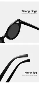 Detail view of durable hinge and comfortable legs of cute cat ear kids sunglasses.
