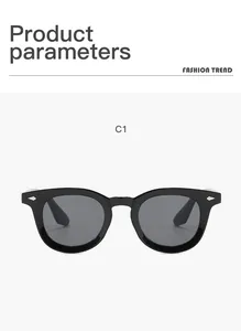 Detail view of black vintage oval frame sunglasses with silver rice nail accents