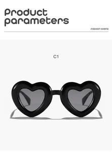 Front macro view of stylish black heart-shaped sunglasses for kids with grey lenses