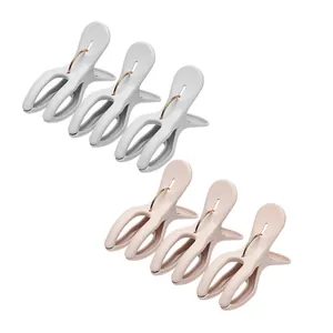 Set of 6 large windproof plastic quilt clips for laundry drying in pink and grey colors