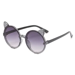 Children's round cat-ear sunglasses with sparkly jelly grey frames and purple gradient lenses