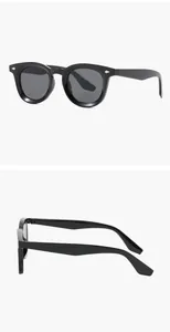 Detailed views showing black vintage oval sunglasses with decorative diamond rivets on frame.