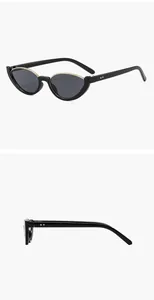 Chic black cat eye sunglasses with gold rim detail shown from front and side views