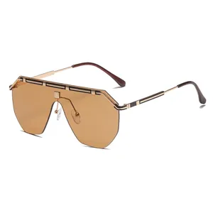 Retro oversized shield sunglasses with one-piece brown lenses and gold metal frame
