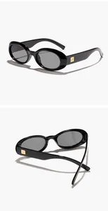 Close-up detail views showing the black oval retro sunglasses with gold temple accents