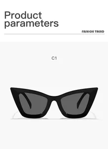 Gros plan sur des lunettes de soleil œil-de-chat noires surdimensionnées pour femmes