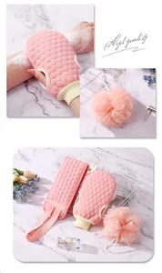 Detailed view of pink honeycomb exfoliating bath set including glove, strap and sponge