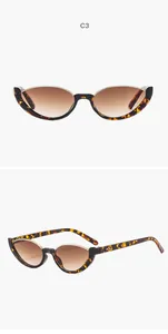 Retro cat-eye semi-rimless sunglasses with leopard print and brown gradient lenses.
