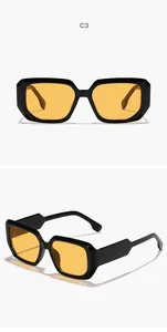 Detailed front and side view of classic black thick frame sunglasses with yellow lenses