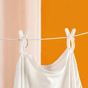 Set of durable windproof plastic clothespins for securing heavy quilts and laundry on a line