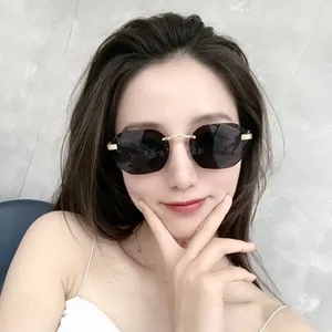 Damen Randlose Kleine Sonnenbrille Rechteckige Ozeangläser Retro Metallrahmen Sonnenbrille UV400 Mode Brillen Für Den Alltag Party