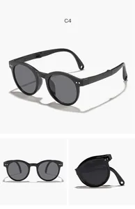 Detailansicht der faltbaren runden Kindersonnenbrille in Schwarz mit Klappmechanismus