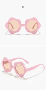 Pink flower-shaped sunglasses for kids featuring light orange lenses in a white background