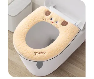Detailed view of cute yellow sheep cartoon plush toilet seat cover for winter warmth