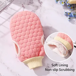Pink honeycomb textured exfoliating bath glove with soft lining and elastic wristband
